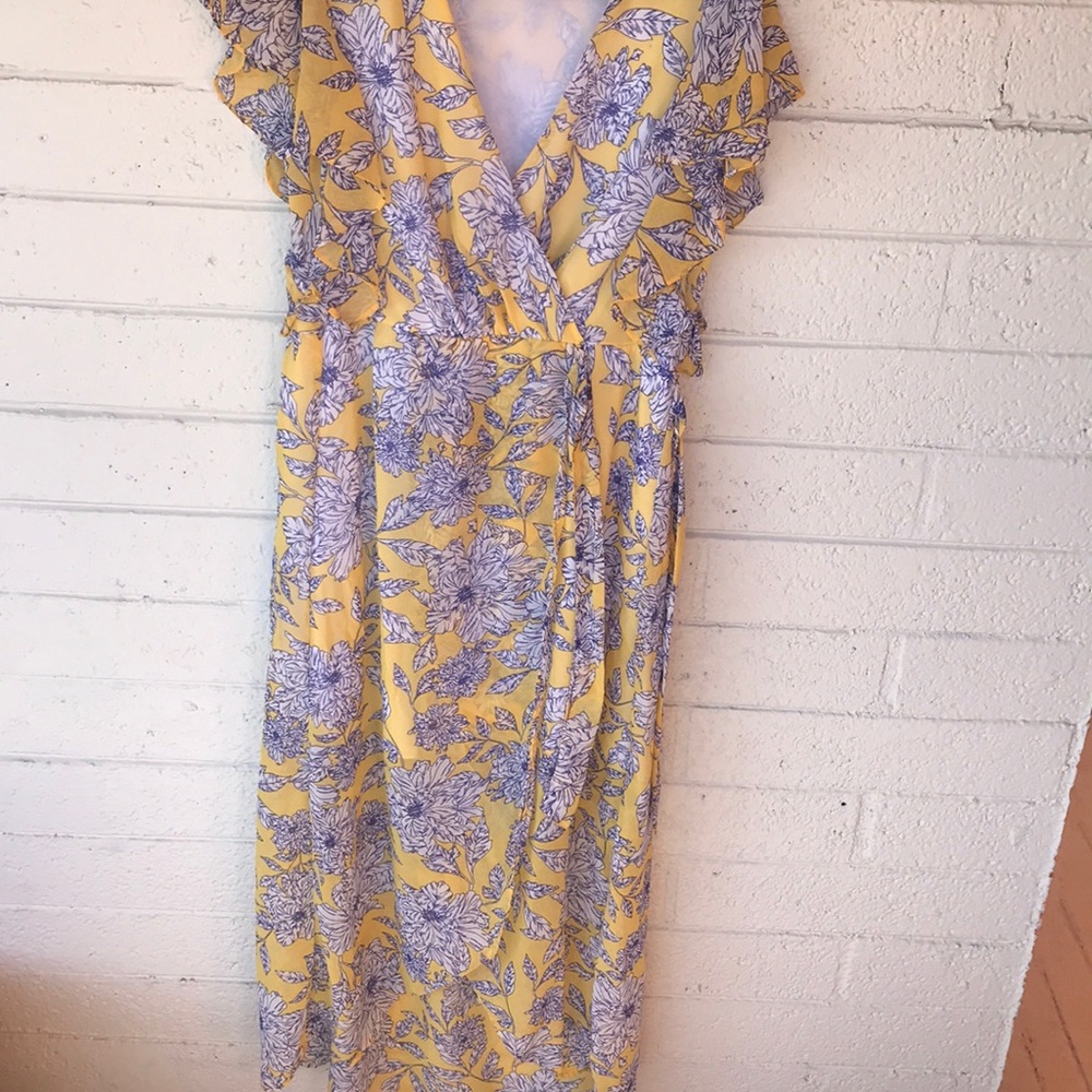 Yellow high low dress with blue flowers